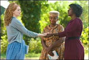 Emma Stone, Octavia Spencer and Viola Davis are shown in a scene from 
