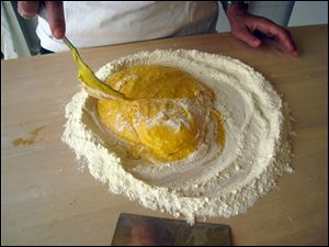Students learn to make Bolognese
pasta.