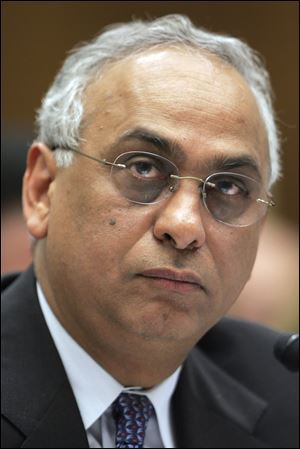 Standard and Poor's President Deven Sharma testifies on Capitol Hill in Washington in 2008. The McGraw-Hill Cos., the parent of S&P, on Monday, Aug. 22, 2011 said Sharma is stepping down, an announcement coming only weeks after the rating agency's unprecedented move to strip the United States of its AAA credit rating.