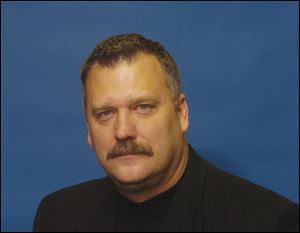 A Dec. 21, 2007 photo shows Tom Kowalski, longtime Detroit Lions writer for Booth Newspapers and MLive. Kowalski, who covered the Detroit Lions for about three decades, has died.