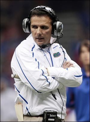 Health concerns forced Urban Meyer to leave Florida, where he won two NCAA titles.