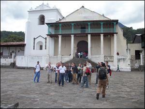 St. John’s students gather in a plaza in front of St. James Catholic Church in Santiago Atitlan, Guatemala. The former president of St. John's Jesuit High School has founded International Samaritan, an Ann Arbor-based nonprofit organization. A group of 20 St. John's Jesuit High School students went to Guatemala to work with children at the school established by International Samaritan, which has now been recognized by the U.N.