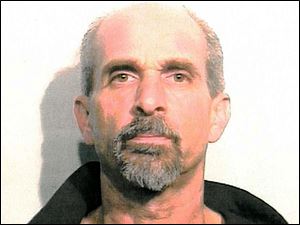 Brian Lipp was wanted in the armed robbery of a Toledo drug store.