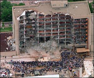 Thousands of search and rescue crews attend a memorial service May 5, 1995, in front of the Alfred P. Murrah Federal Building in Oklahoma City, after an explosion killed 168 people and injured  hundreds more April 19, 1995.