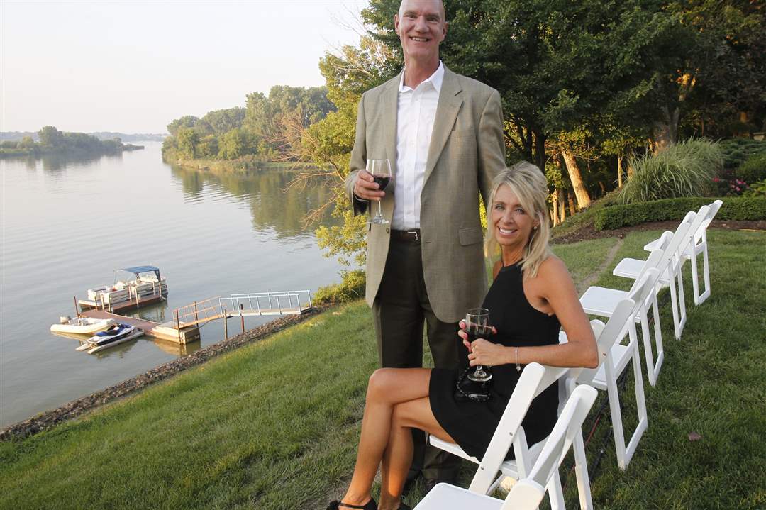 David-Baymiller-left-and-Lisa-Welch-enjoy-the-backyard-view