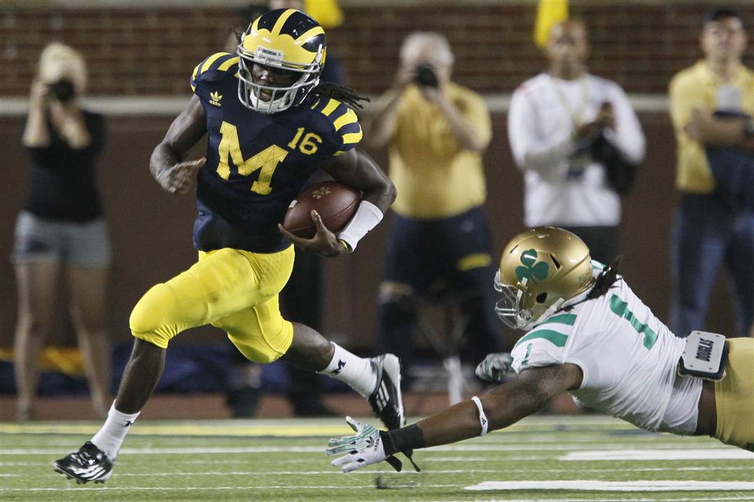 UM-Denard-Robinson-1st-down