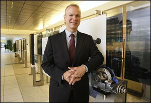 Roger Wood, CEO of Dana Holding Corp., poses at the company's offices in Maumee on Thursday.