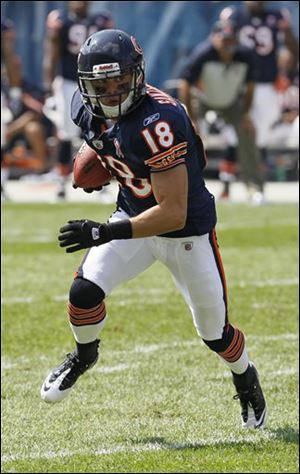 Bears wide receiver Dane Sanzenbacher (18) runs against Falcons defense in the first half in Chicago on Sunday.