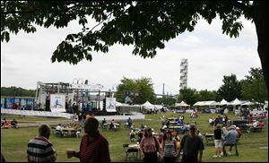 People have fun at The Red, White & Kaboom Fireworks with the Taste of Toledo at Promenade Park.