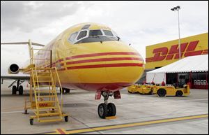 Toledo-Lucas County Port Authority committee Friday approved a 3-year, month-to-month lease with DHL Express (USA, Inc.).