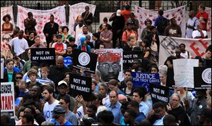 Hundreds of protesters gather at the Georgia State Capitol in Atlanta to protest the execution of Troy Anthony Davis on Tuesday.