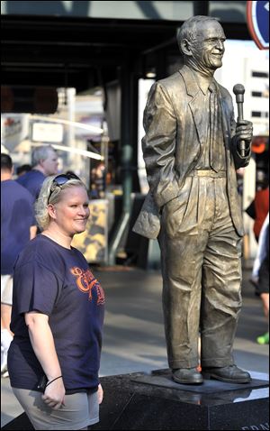Detroit News/Robin BucksonThe white bronze statue of legendary broadcaster Ernie Harwell had its glasses ripped off sometime this summer. The glasses have been reattached to the figure.