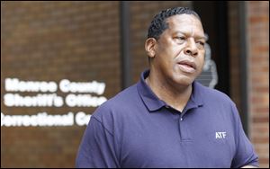 Special Agent Donald Dawkins, with the ATF, speaks to reporters about the car bomb outside of the Monroe County Sheriff's Office on September 21, 2011.