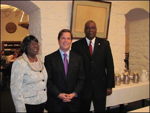 Senators Edna Brown and Mark Wagoner with representative Michael Ashford.           