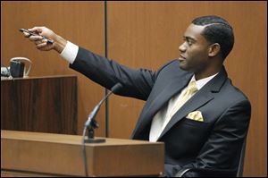 Michael Jackson's personal assistant, Michael Amir Williams, testifies during the second day of Conrad Murray's involuntary manslaughter trial in the death of pop star Michael Jackson in downtown Los Angeles,  Wednesday, Sept. 28, 2011.