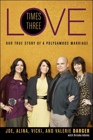 Cover of Darger family book Love Times Three: left to right: Vicki, Valerie, Joe, and Alina Darger.¤Handout.  Not Blade photo.
