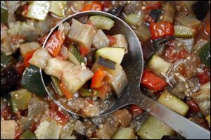 Ratatouille with zucchini, eggplant, tomatoes, red pepper, and spices.