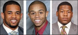 Ohio State football players Daniel Herrion, left, DeVier Posey, center, and Marcus Hall have been suspended for the Buckeyes' game against Nebraska.