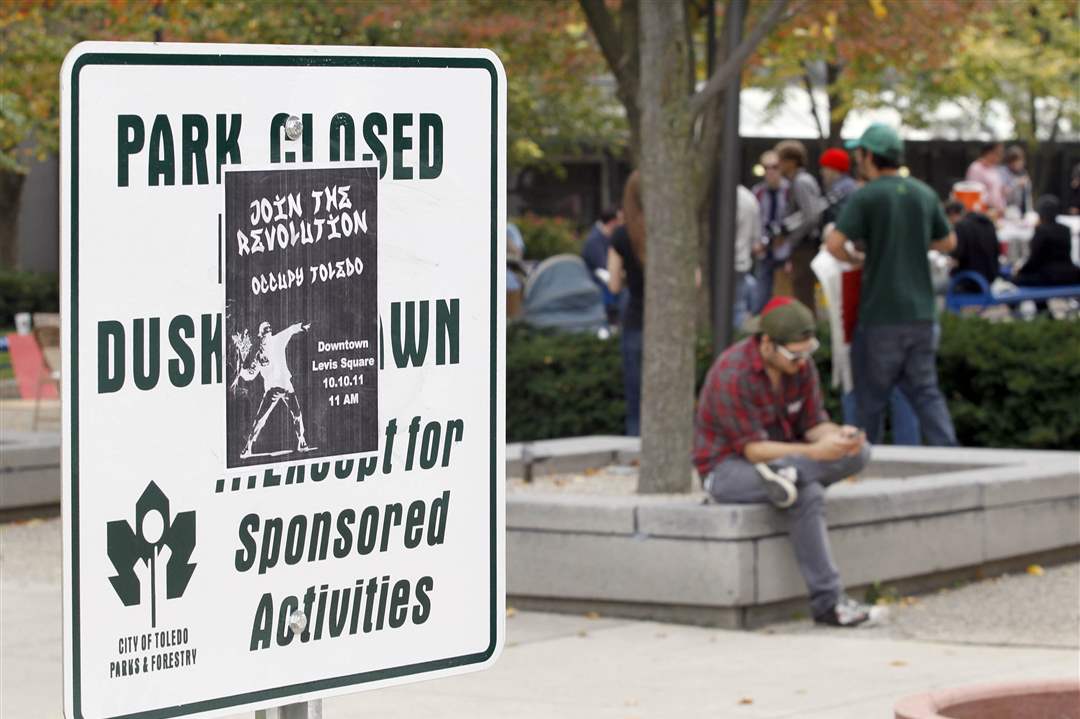 join-revolution-sign-occupy-toledo