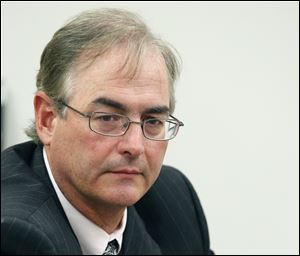 Dennis Lyle, a Toledo trial lawyer, is the Southview team's coach, leading it to five state championships in 16 years.