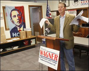 Ohio Democratic Party chairman Chris Redfern speaks during a press conference at Toledo's Democratic Party headquarters on Tuesday.