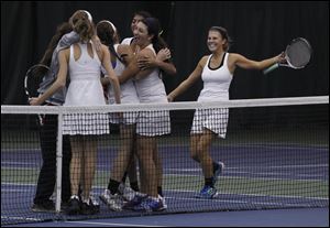 Notre Dame's Meredith Smietanski, right, joins her team after the squad defeated Central Catholic for a fourth straight trip to the final four.  