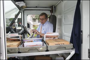 Randy Warner, a postal employee for 40 years, says he has watched children on his route grow up and Northwood farmland give way to roads and businesses.
