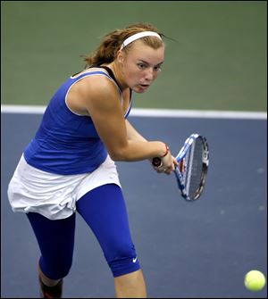 St. Ursula freshman Kennedy Shaffer returns a shot during quarter final action at the Elysium Tennis Center, Plain City, Ohio.  Shaffer eventually placed 3rd in the Division I singles at the Ohio High School Athletic Associations 36th Annual Girls State Tennis Championships on Saturday.