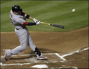 St. Louis Cardinals' Allen Craig hits a home run during the first inning of Game 3 of baseball's World Series against the Texas Rangers on Saturday.