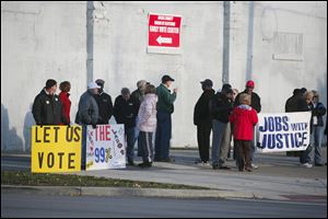 About 25 people showed up to rally outside the Early voting Center in opposition to the end of early voting. Pastors, union members, and students groups plan to rally outside the Early Voting Center at 13th and Washington streets of the Lucas County Board of Elections in opposition to the end of early voting.