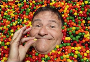 David Klein, a man who invented the Jelly Belly, poses for photos in Covina, Calif