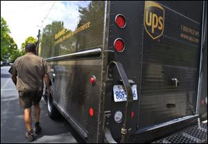 United Parcel Service expects to hire 55,000 temporary workers this year to handle an increase in holiday package shipping.