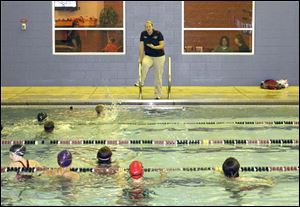 Stingray coach Tiffany Quisno instructs her team during practice at the YMCA in Temperance.