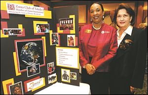 Billie Johnson, who has been in the club 35 years, and Jan Shearer, who has been in the club 37 years, attend the Zonta's 90th anniversary celebration at the Toledo Club in Toledo, Ohio. Both are past presidents of Zonta Club of Toledo 1.