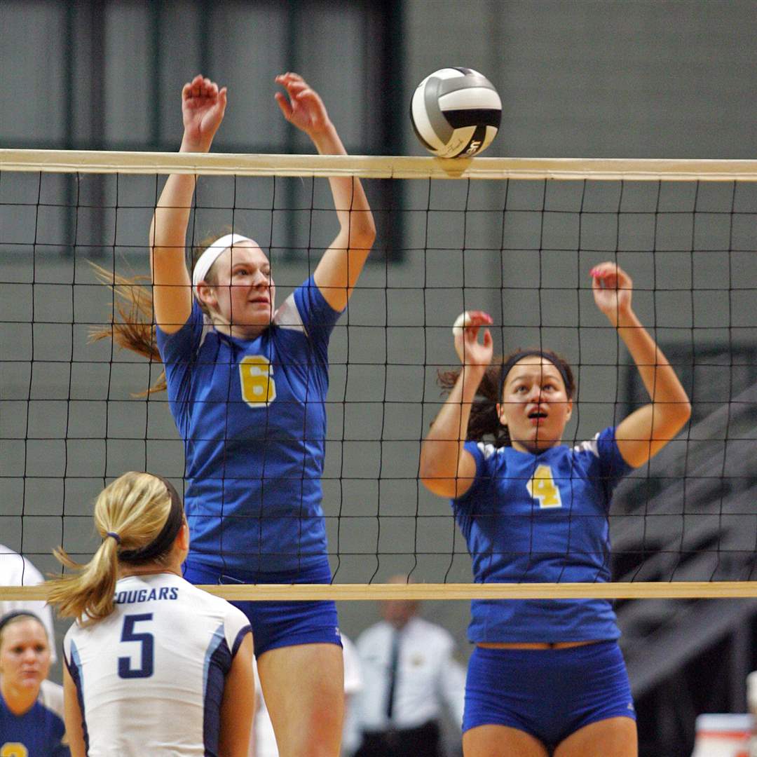 St-Ursula-s-Cassidy-Corci-6-and-Erin-Williams-4-wait-for-a-ball-to-roll-of-the-net