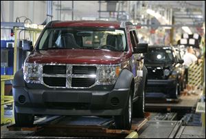 Chrysler Group LLC is expected to announce Wednesday it will invest $365 million in the Toledo factory that makes the Dodge Nitro, above. As many as 1,100 jobs plus expansion to make additional vehicles are among plans outlined in tax-aid applications.