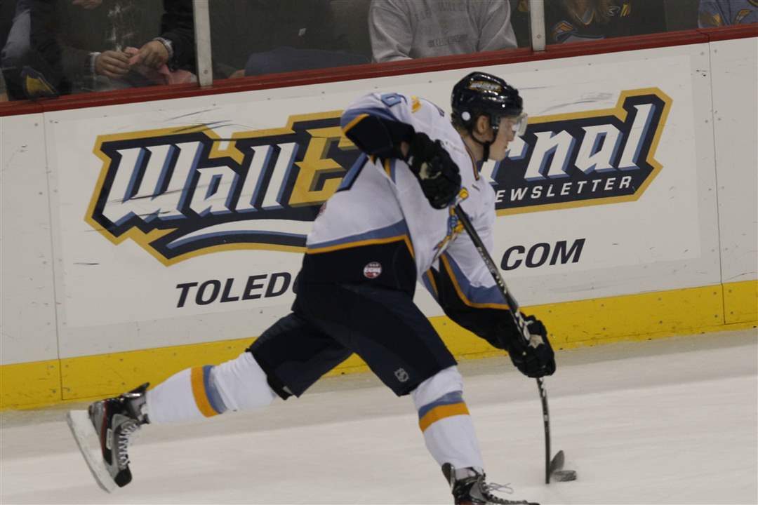 Toledo-Walleye-fires-puck-down-ice-Gwinnett
