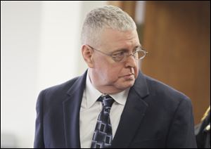 Mark Langlois appears in Lucas County Common Pleas Court Tuesday.