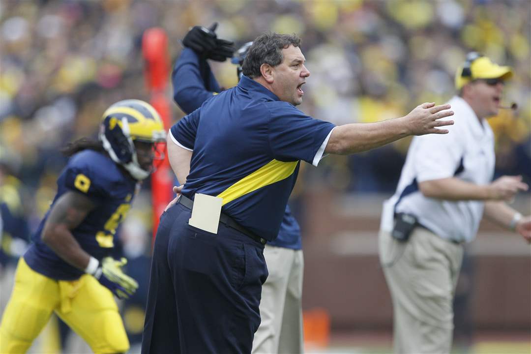 UM-coach-Brady-Hoke-directs-his-team-against-Nebraska