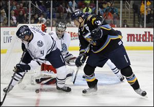 Toledo Walleye defenseman Kevin Harvey (13), right-side, was traded to Elmira on Friday for defenseman Joey Ryan.