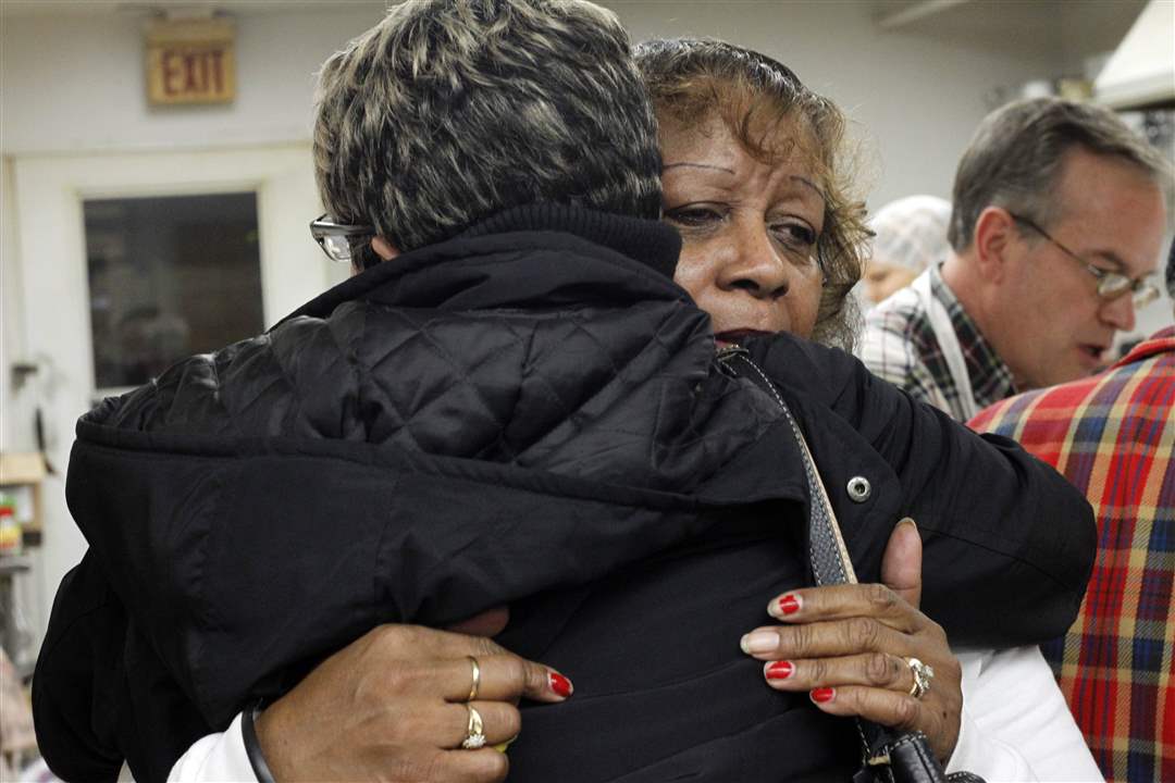 MLK-Kitchen-Henrietta-Armstrong-hug