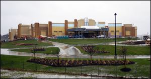 Refusal by a holding company's directors to meet requests may slow Hollywood Casino Toledo's opening.