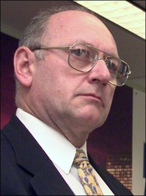 Dan Hiskey, left, was appointed by Mayor Mike Bell to study a 2010 audit of the city's federal grant funds.