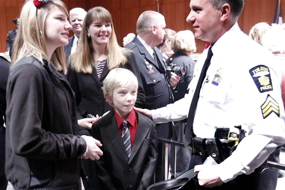 cook-stands-with-daughter-and-son