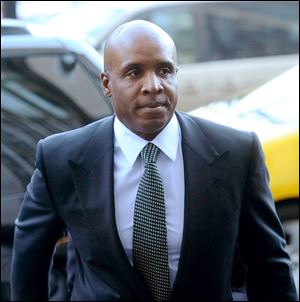 Former baseball player Barry Bonds arrives Friday at federal court in San Francisco.