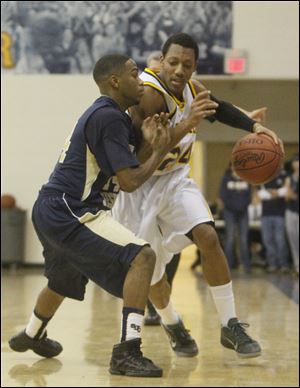 LeRoy Alexander is a star on Whitmer's basketball team. He was also a key football player.