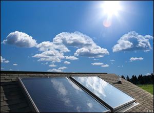 Low profile solar collectors, which look like skylights, blend well with rooflines.