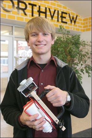 Kyle Lammie, who says he prefers to ride at night, created a solution to dark roadways. 