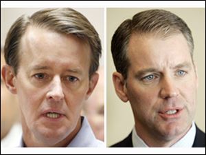 Democratic Chairman Chris Redfern, left, and Republican Chairman Kevin DeWine join forces to seek money for a food bank. 