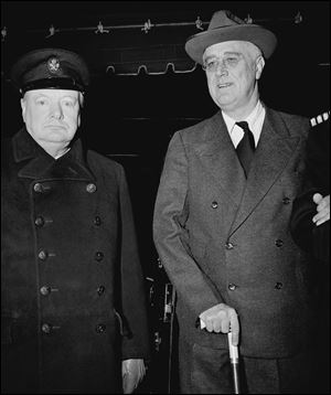 British Prime Minister Winston Churchill, left,  and President Franklin Roosevelt pose on the South Lawn of the White House on Dec. 22, 1941.